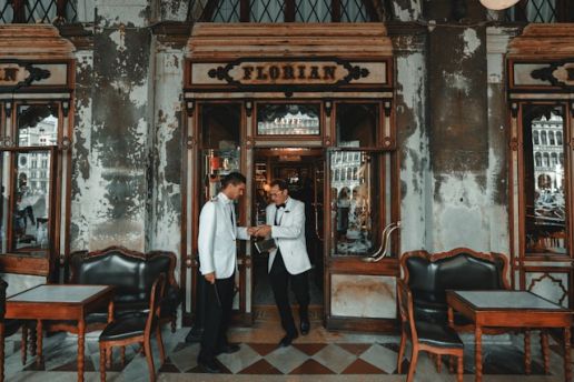 Waiters outside Caffè Florian in Piazza San Marco, Venice
